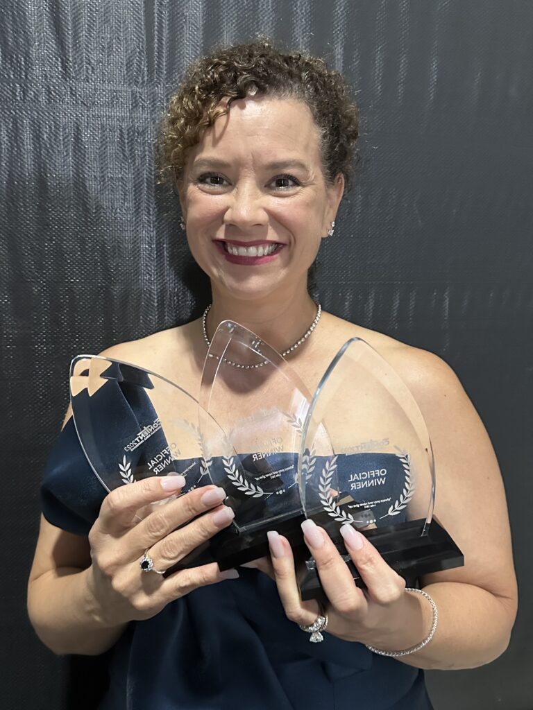 dr. lynnette simm winner conent 2023 film festival and news media summit